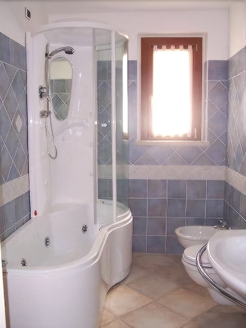 Imagen de la habitación del Hotel Castello Di Tavolara. Foto 16