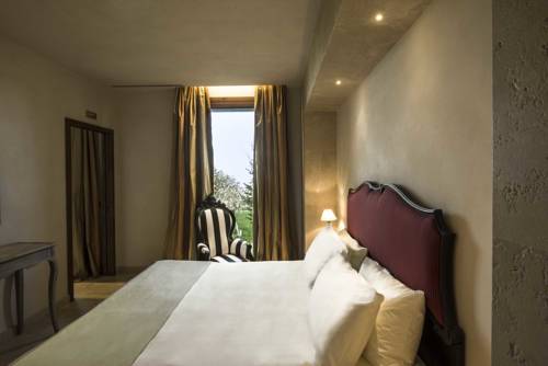 Imagen de la habitación del Hotel Castello Di Velona Resort Thermal Spa and Winery. Foto 8