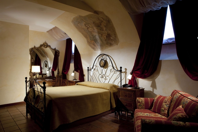 Imagen de la habitación del Hotel Castello della Castelluccia. Foto 8