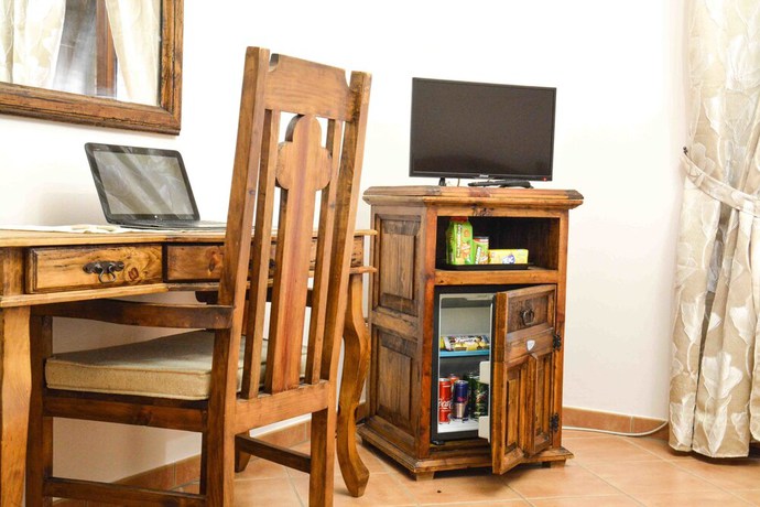 Imagen de la habitación del Hotel Castello di Giuliano. Foto 12