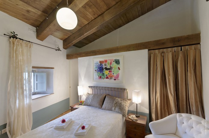 Imagen de la habitación del Hotel Castello di Postignano Relais. Foto 11