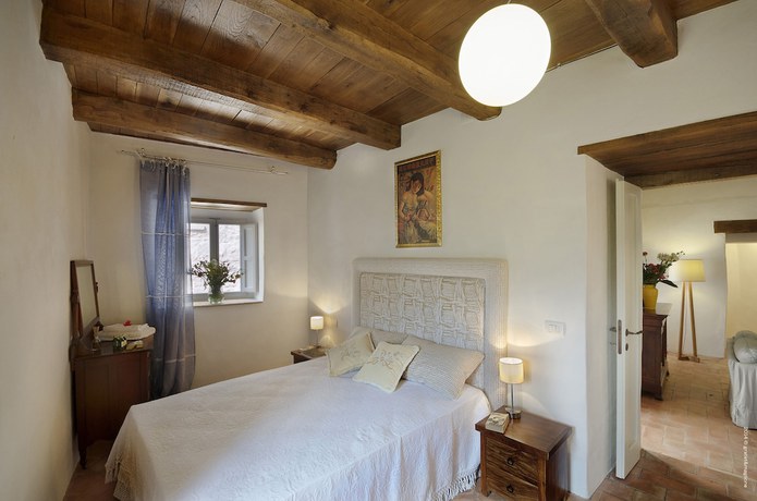 Imagen de la habitación del Hotel Castello di Postignano Relais. Foto 17