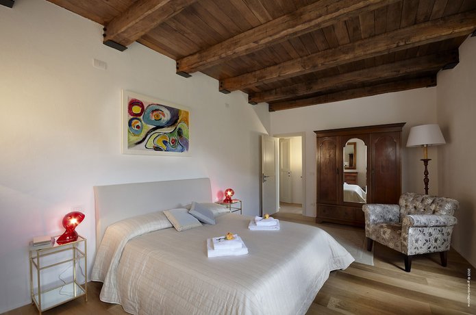 Imagen de la habitación del Hotel Castello di Postignano Relais. Foto 19