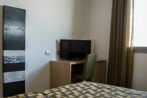 Imagen de la habitación del Hotel Castelmartini. Foto 10