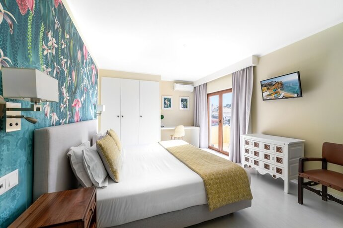 Imagen de la habitación del Hotel Castelo Guest House. Foto 15