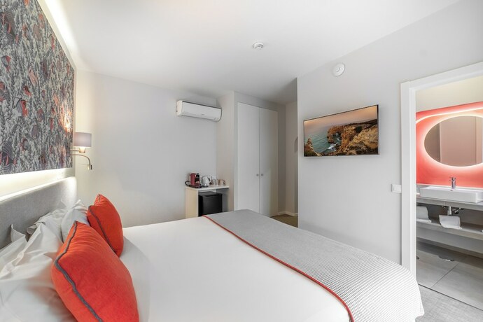 Imagen de la habitación del Hotel Castelo Guest House. Foto 20