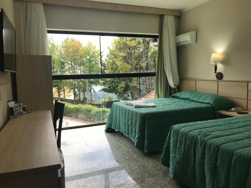Imagen de la habitación del Hotel Castelo Nacional Inn Campos Do Jord&atilde;o. Foto 10