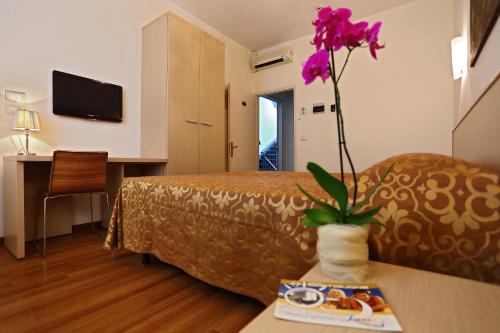 Imagen de la habitación del Hotel Castiglione. Foto 10