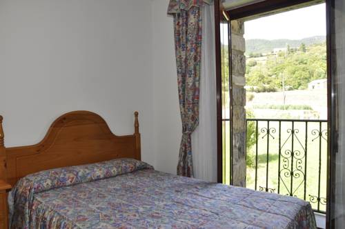 Imagen de la habitación del Hotel Castillo D'acher. Foto 8