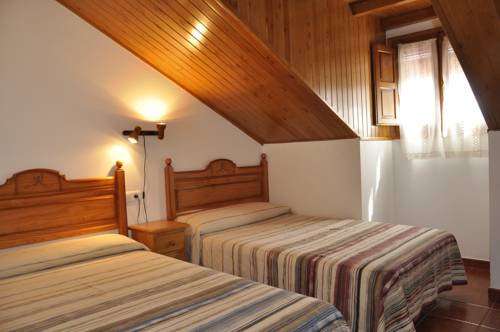 Imagen de la habitación del Hotel Castillo D'acher. Foto 16