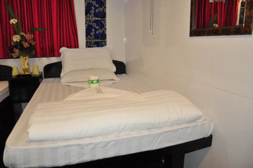 Imagen de la habitación del Hotel Castle Inn, Kowloon. Foto 6