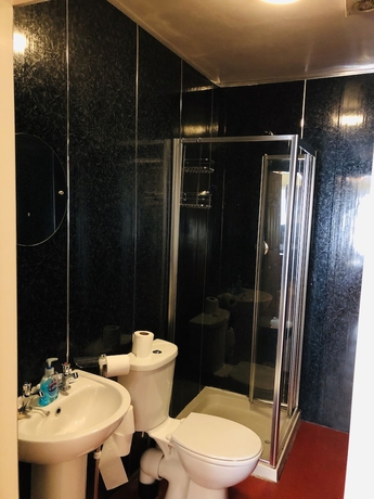 Imagen de la habitación del Hotel Castle Lodge Guest House. Foto 11