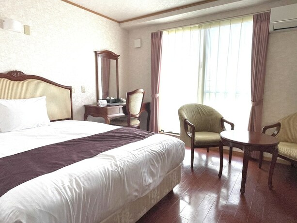 Imagen de la habitación del Hotel Castle Village Miyakojima. Foto 18