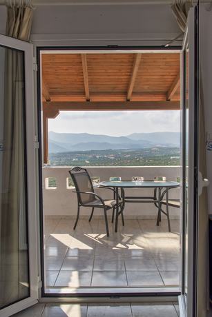 Imagen de la habitación del Hotel Castri Village. Foto 16