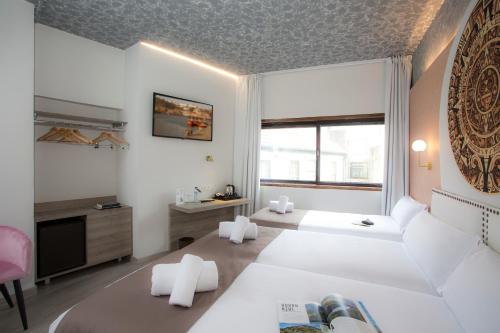 Imagen de la habitación del Hotel Casual Inca Porto. Foto 18