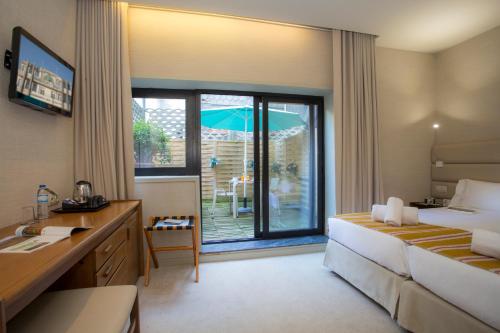 Imagen de la habitación del Hotel Casual Inca Porto. Foto 19