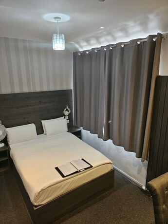 Imagen de la habitación del Hotel Casuarina Tree. Foto 19