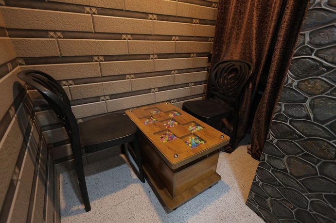 Imagen de la habitación del Hotel Cat, Rajkot. Foto 3