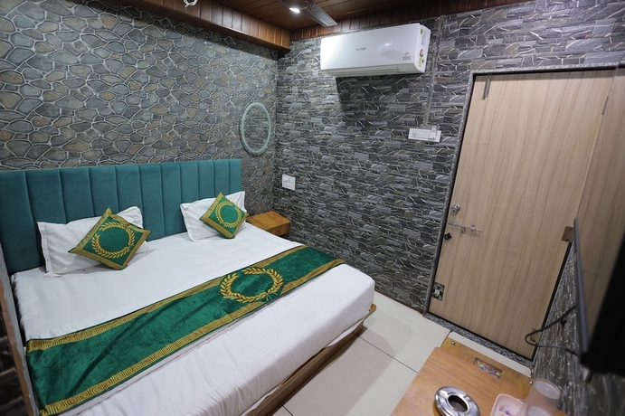 Imagen de la habitación del Hotel Cat, Rajkot. Foto 6