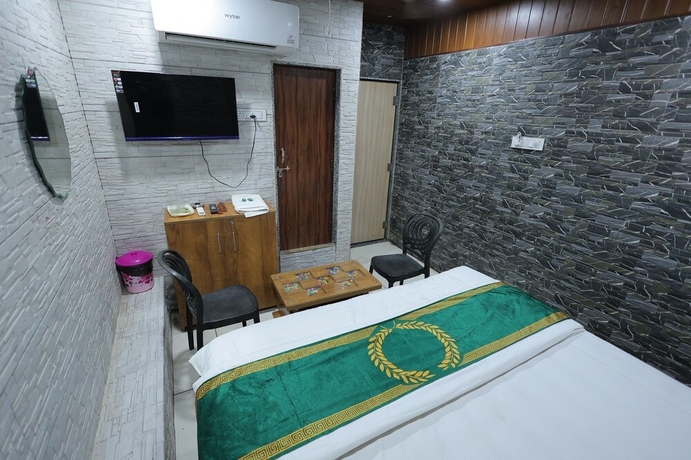 Imagen de la habitación del Hotel Cat, Rajkot. Foto 10