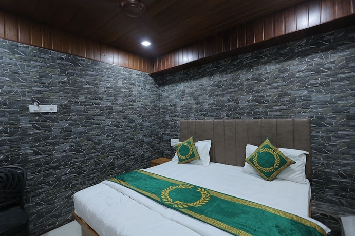 Imagen de la habitación del Hotel Cat, Rajkot. Foto 11