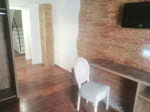 Imagen de la habitación del Hotel Catalina Suites. Foto 10