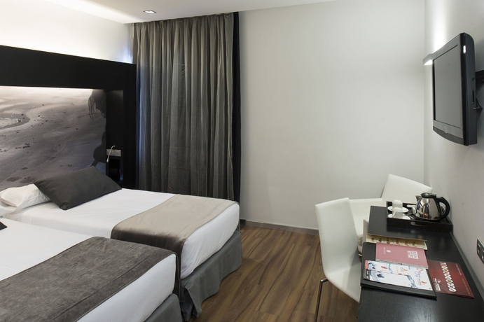 Imagen de la habitación del Hotel Catalonia Catedral. Foto 11