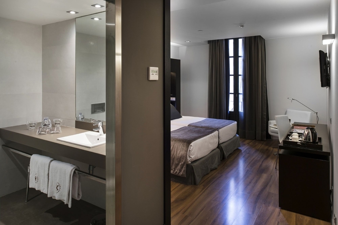 Imagen de la habitación del Hotel Catalonia Catedral. Foto 12