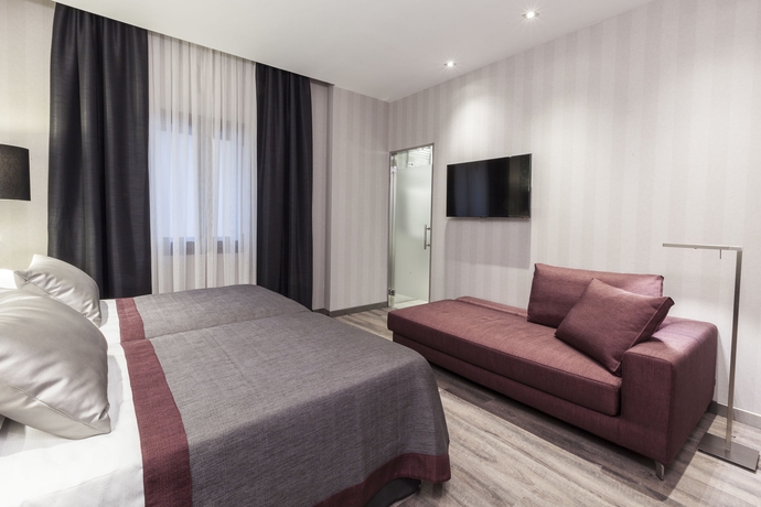 Imagen de la habitación del Hotel Catalonia Excelsior. Foto 9