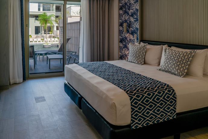 Imagen de la habitación del Hotel Catalonia Grand Costa Mujeres All Suites and Spa - All Inclusive. Foto 7