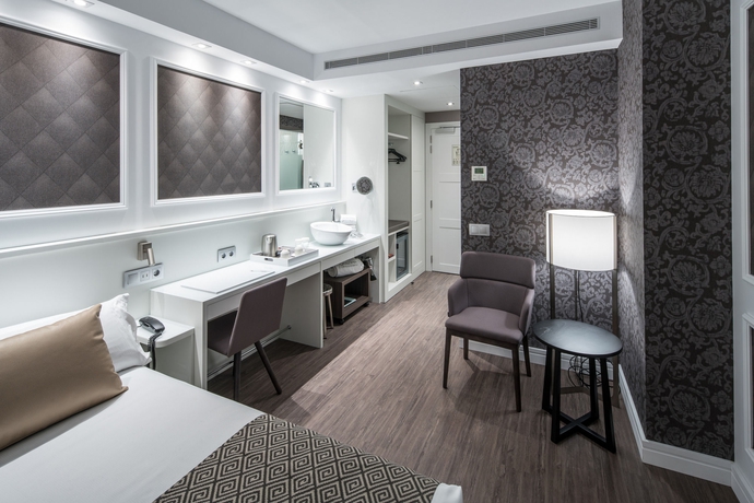 Imagen de la habitación del Hotel Catalonia Magdalenes. Foto 12