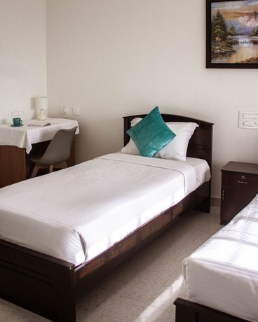 Imagen de la habitación del Hotel Catalyst Suites. Foto 3