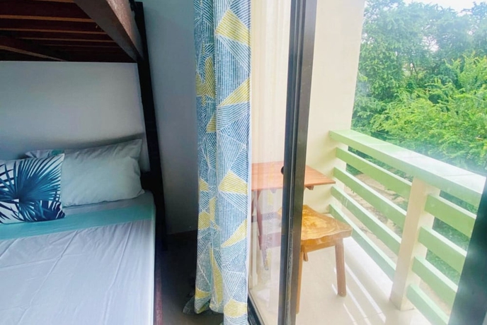 Imagen de la habitación del Hotel Catappa Lodge Puerto Galera. Foto 7