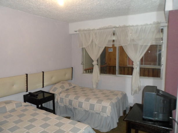 Imagen de la habitación del Hotel Catedral Cuenca. Foto 3