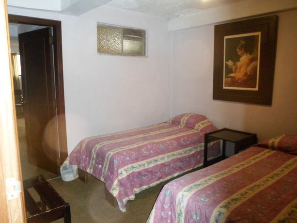 Imagen de la habitación del Hotel Catedral Cuenca. Foto 7