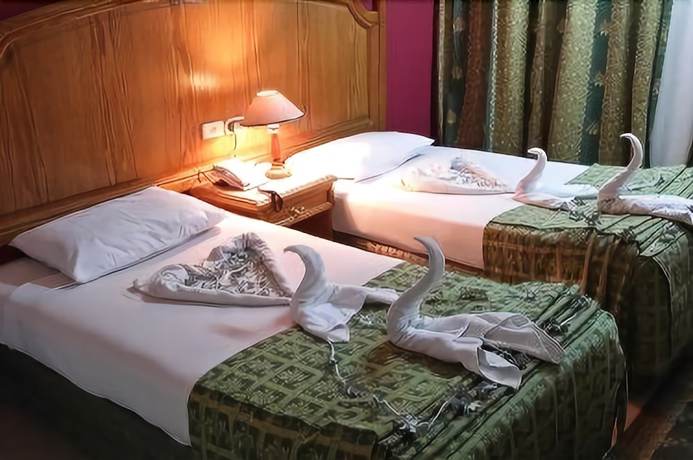 Imagen de la habitación del Hotel Catherine Plaza. Foto 8