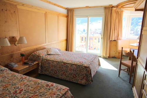 Imagen de la habitación del Hotel Catinaccio Rosengarten. Foto 4