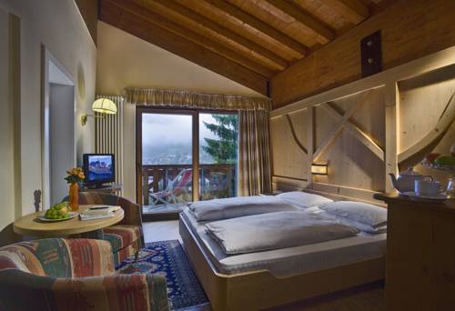 Imagen de la habitación del Hotel Catinaccio Rosengarten. Foto 5