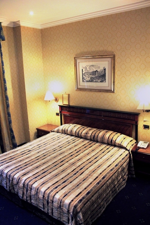 Imagen de la habitación del Hotel Catone. Foto 9
