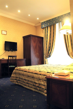 Imagen de la habitación del Hotel Catone. Foto 10