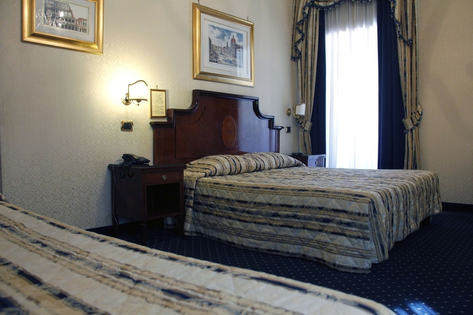 Imagen de la habitación del Hotel Catone. Foto 13