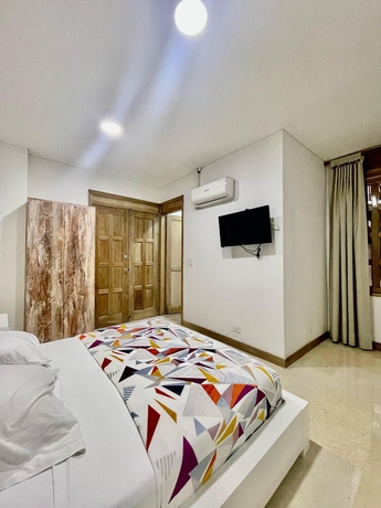 Imagen de la habitación del Hotel Cattaleya. Foto 5