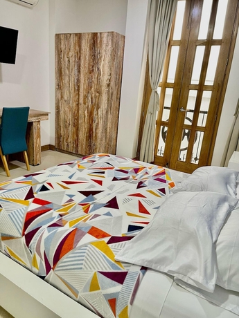Imagen de la habitación del Hotel Cattaleya. Foto 11