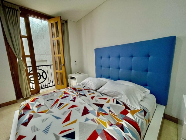Imagen de la habitación del Hotel Cattaleya. Foto 14