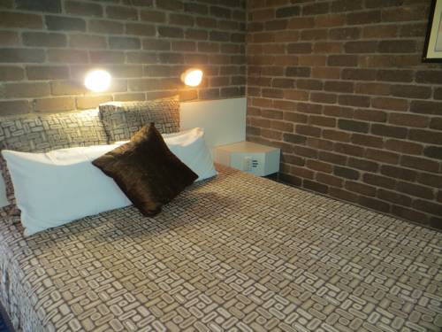 Imagen de la habitación del Hotel Cattleman's Rest Motor Inn. Foto 5