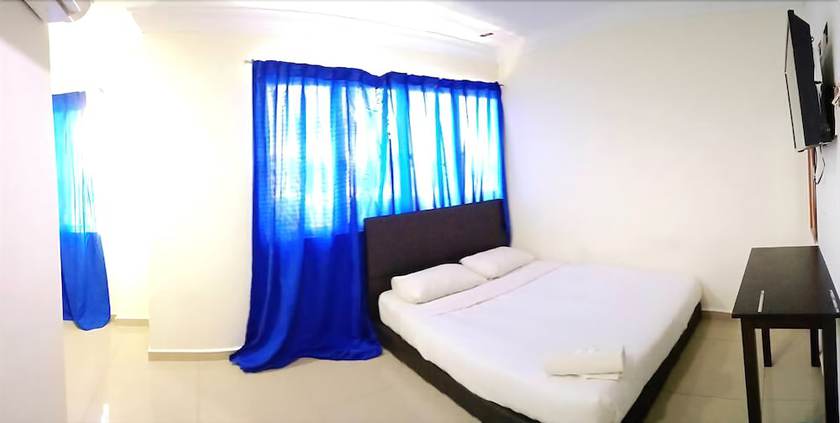Imagen de la habitación del Hotel Cattleya Glory. Foto 3