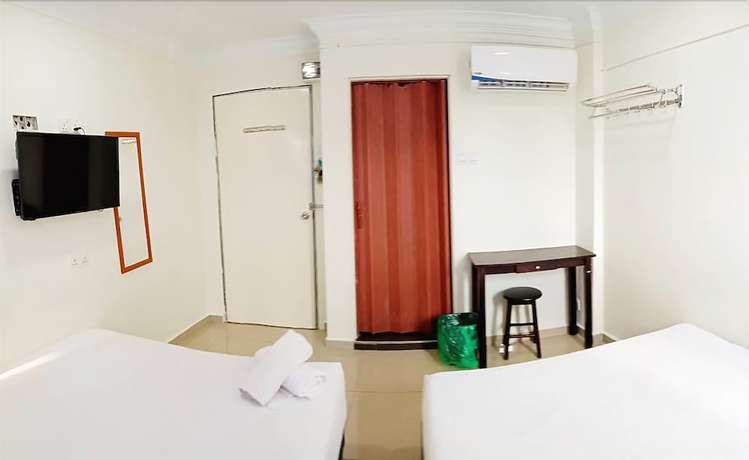 Imagen de la habitación del Hotel Cattleya Glory. Foto 5
