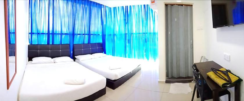 Imagen de la habitación del Hotel Cattleya Glory. Foto 6