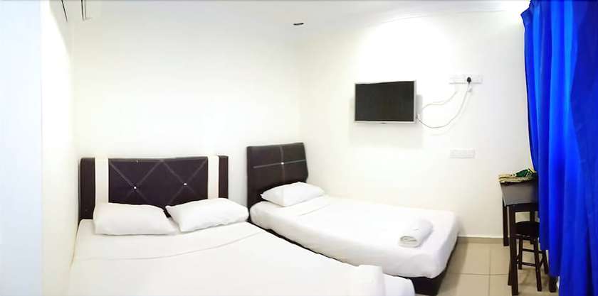 Imagen de la habitación del Hotel Cattleya Glory. Foto 7