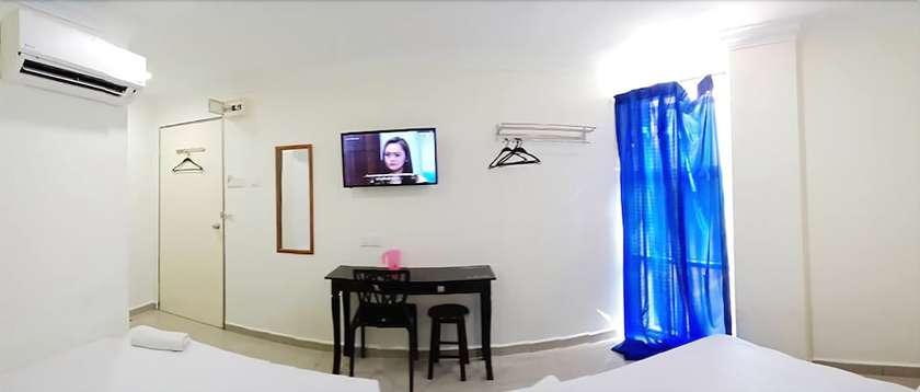Imagen de la habitación del Hotel Cattleya Glory. Foto 8